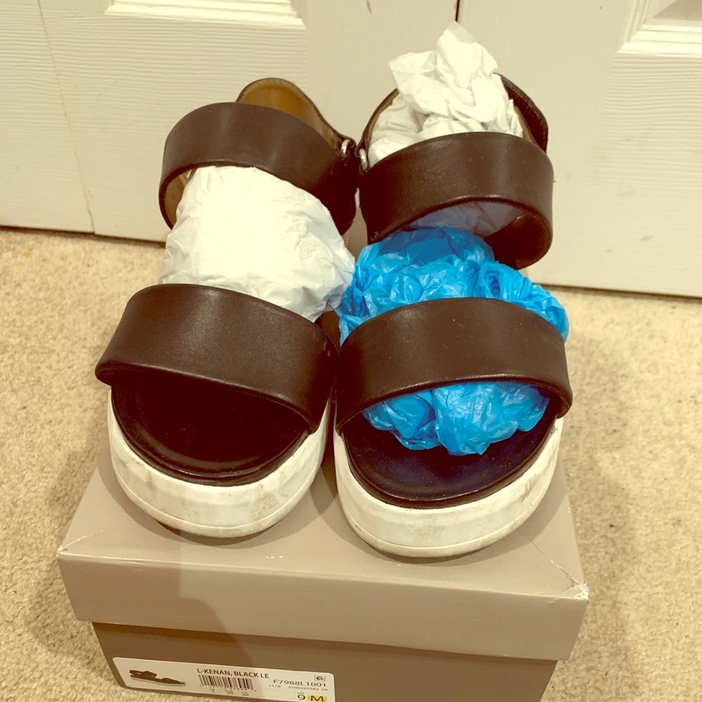 Franco Sarto flat platform sandals.
